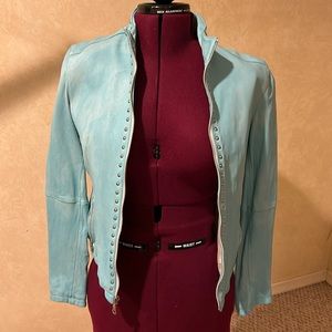 Women’s genuine Wilson’s Leather jacket, sky blue and white, size large.